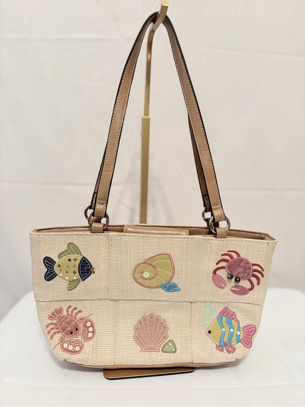 beige woven beach theme shoulder handbag from Rosetti. - Picture 2 of 11